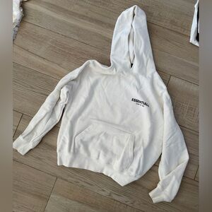 Fear of God Essentials White Hoodie. Real